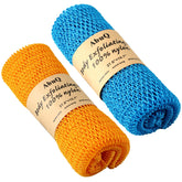 Éponge filet africain AbuQ bleu et orange pour exfolier en profondeur.