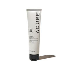 Acure Bonding Hair Mask sur la bouteille, soin réparateur idéal pour cheveux abîmés.
