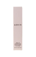Baume à lèvres AERIN, senteur rose signature pour une expérience apaisante lors de l'application.