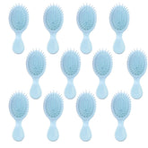 Brosse humide mini AESPAKO en voyage pour démêler en douceur.