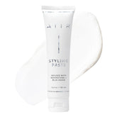 AIIR Pâte de coiffage, bouteille et texture lisse, pour une coiffure définie.