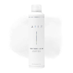 AIIR Texture Styling Spray — image bouteille montrant le volume durable et une tenue légère.