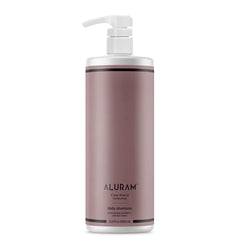 ALURAM Shampoing quotidien à l’eau de coco — bouteille lumineuse pour hydratation durable.