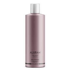 Shampoing ALURAM à l’eau de coco en bouteille, hydratation et brillance.