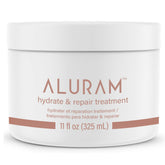 ALURAM Hydrate & Repair, flacon soin cheveux abîmés offrant hydratation en profondeur.