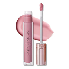 Lip Gloss Cotton Candy d'Anastasia sur la bouteille, brillance immédiate.