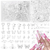 AnoleAir charmes argent croix et étoiles pour ongles, allure audacieuse.