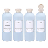 ASEVAT ensemble de 4 flacons shampoing et conditionneur pour voyage.