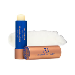 Baume à lèvres Augustinus Bader, texture-onctueuse pour hydratation rapide.