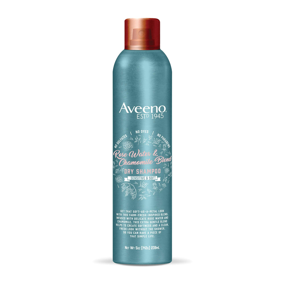 Aveeno shampooing sec, bouteille rose camomille, fraîcheur rapide sans lavage.