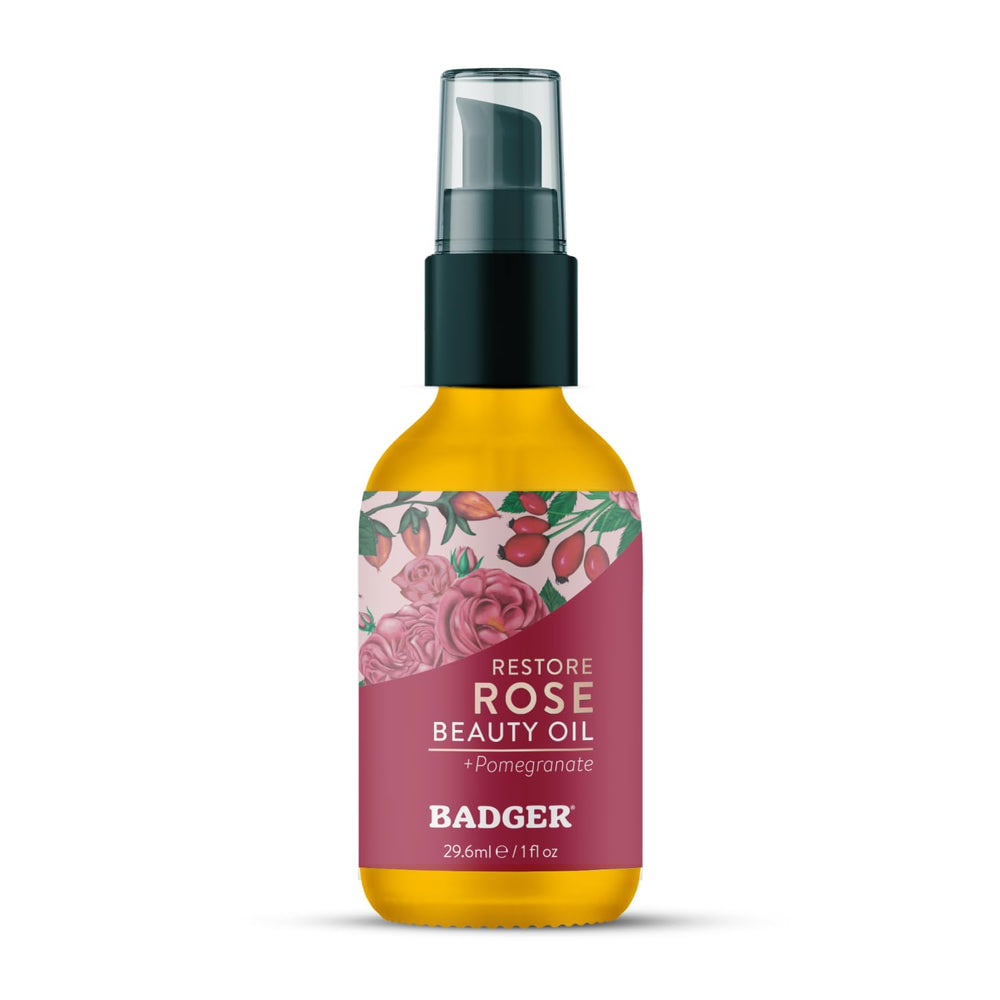 Huile Badger Rose dans bouteille en verre, hydratation légère pour le visage.