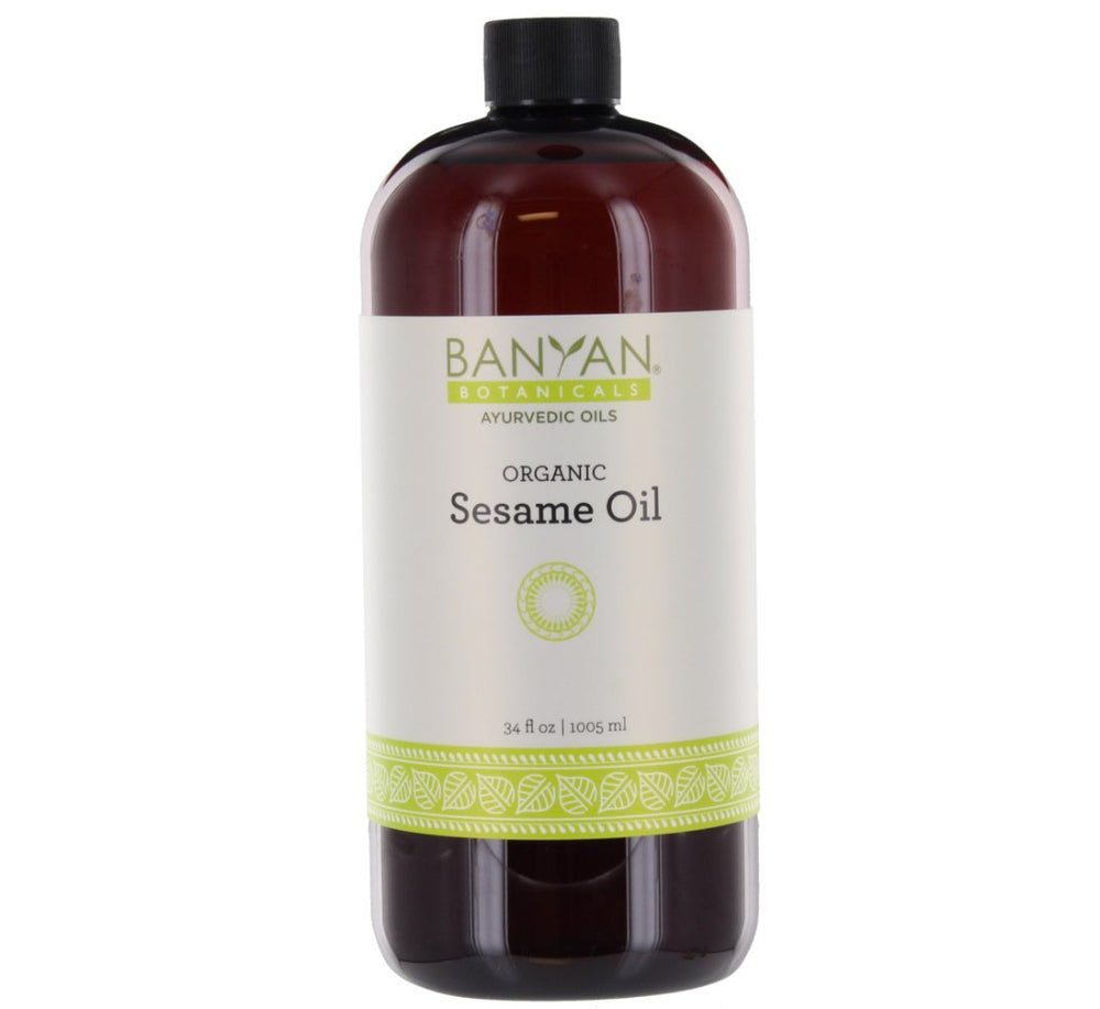 Banyan Botanicals huile de sésame, bouteille ambrée prête à nourrir la peau.