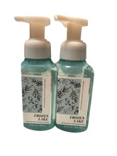 Bath & Body Works Gentle Foaming Hand Soap Frozen Lake bottle pour showing rich foam for clean hands.