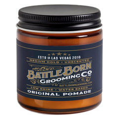 Pomade originale Battle Born: bouteille prête pour une tenue durable et naturelle.