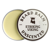 Baume à barbe Striking Viking dans une boîte métallique compacte, idéal pour voyager.