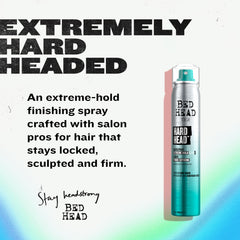 Close-up of Bed Head Hard Head spray being applied to dry hair for instant control.