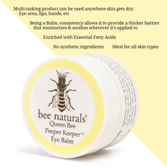 Application shot of Bee Naturals eye balm, creamy texture glides under the eyes.