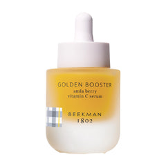 Beekman 1802 Golden Booster Amla, bouteille-pompe, sérum végétal pour peau lumineuse.