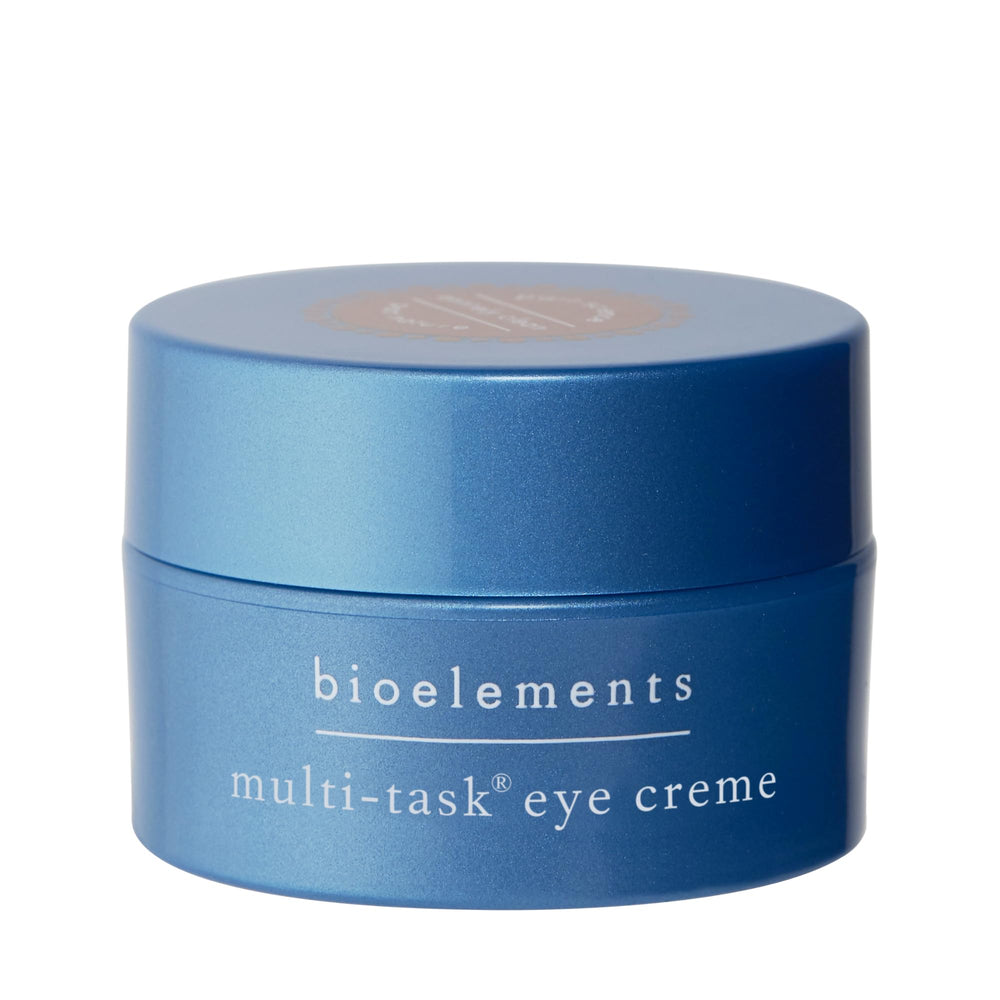 Bioelements Crème Yeux Multi-Action dans son pot, texture légère prête à l'application autour des yeux.