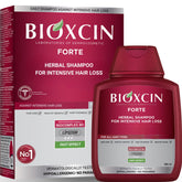 BIOXCIN Shampooing: bouteille rouge, soin capillaire quotidien doux pour cuir chevelu sensible.