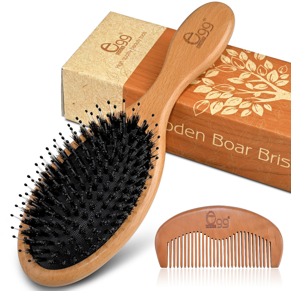 Brosse BLACK EGG pour cheveux mouillés: démêlage en douceur et soin.