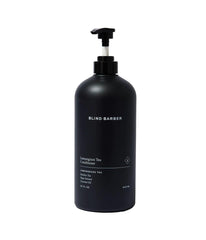 Blind Barber après-shampoing Citronnelle en bouteille, démêle et laisse les cheveux doux.