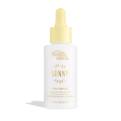 Bondi Sands Sunny Drops SPF 60 serum bottle close-up showing sheer protection on skin.