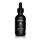 Brickell Huile d'Argan — bouteille visible, cheveux hydratés et brillants.