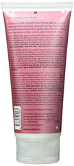 Brocato Curl Karma texture brillante, crème anti-frizz pour une finition lumineuse et veloutée.