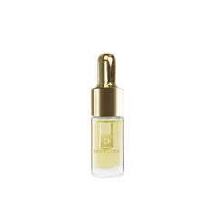 Brow Code GOLD flacon huile sourcils pour nourrir et hydrater.