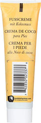 Texture veloutée de Burts Bees Crème Pieds Coco prête à l'application.