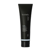 Buttah Skin par Dorion Renaud: bouteille nettoyant visage clarifiant pour usage quotidien.