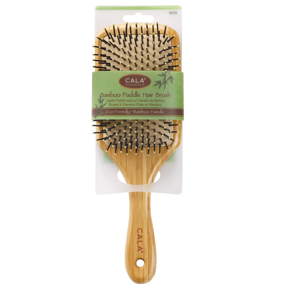 Brosse Cala en bambou, base coussin large, démêle et masse le cuir chevelu en douceur.