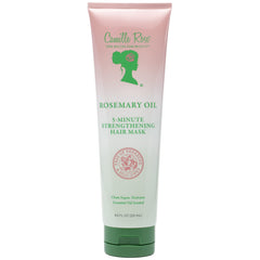 Masque fortifiant Camille Rose au romarin sur cheveux humides pour soutenir la croissance potentielle.