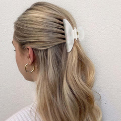 Pinces Canitor marbre rose: allure chic et prise confortable.