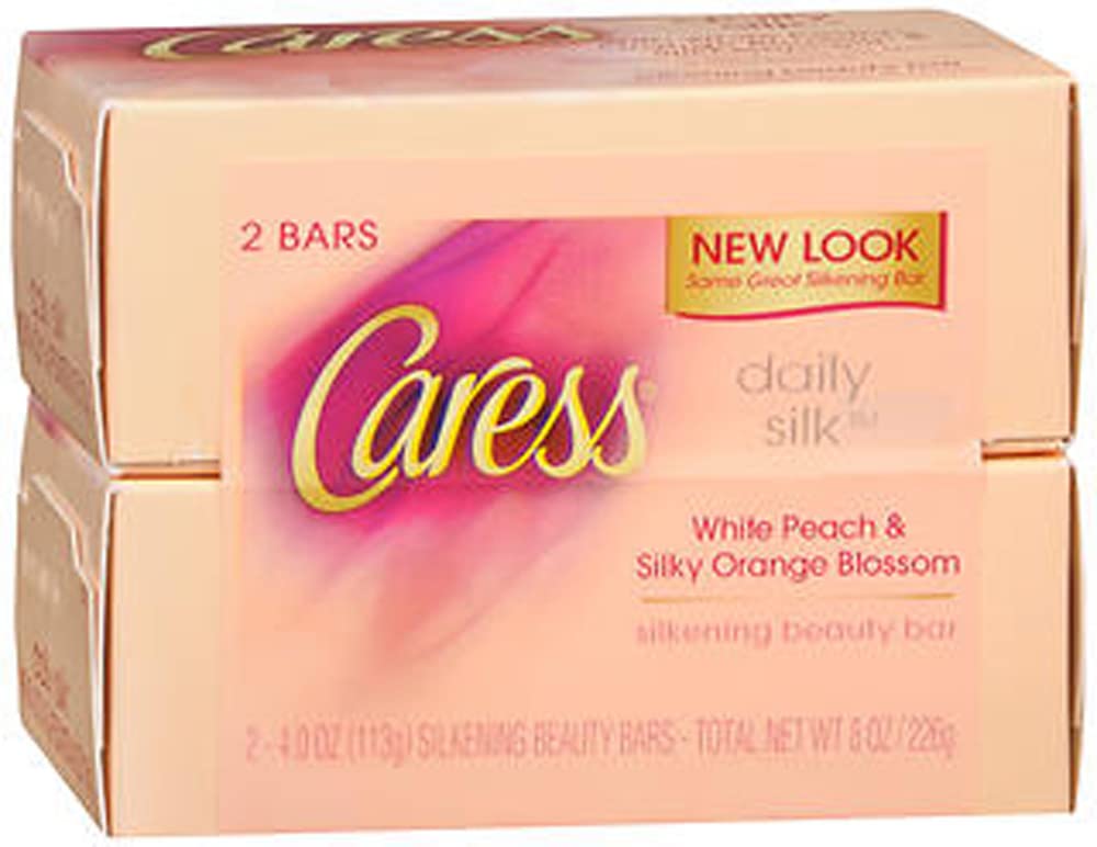Caress Daily Silk Beauty Bars – mousse crémeuse pour peau douce et parfum léger après lavage.