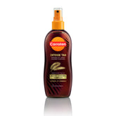 Carroten huile bronzage intensive en spray sur bouteille, format pratique et nourrissante.
