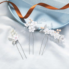 Casdre ornement cheveux mariage fleur perle cristal, effet lumineux.