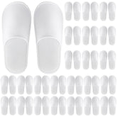 Chaussons jetables Celmuron en peluche blanc, confort immédiat pour les invités.