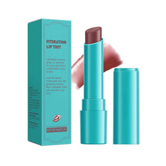 Charm Kiss Teinte Hydratante pour les Lèvres – Bouteille visible, hydratation durable et couleur naturelle.