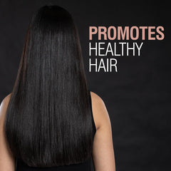 Application CHI sur cheveux humides pour des boucles bien définies.