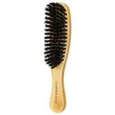 Brosse Combetter à poils de sanglier avec 7 rangs pour lisser les cheveux.