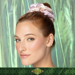 Bandeau faux cuir rose pâle, look chic et féminin Conair.