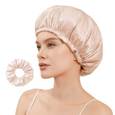 Bonnet CoolMate en soie double-face rose pale protège les cheveux pendant la nuit.