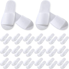 Chaussons jetables Coume à bout ouvert, blanc et confortables.