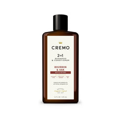 Bouteille Cremo Bourbon & Oak au design élégant, prête pour une routine capillaire premium.