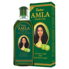 Dabur Amla Huile capillaire — bouteille montrant l'huile nourrissante pour cheveux hydratés