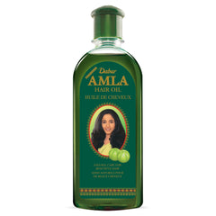 Texture nourrissante de l'huile Amla prête à l'application sur les cheveux