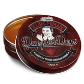 Pommade Deluxe de Dapper Dan, bouteille élégante pour une coiffure nette et lavage facile.