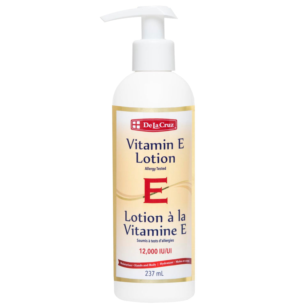 La lotion De La Cruz Vitamine E, bouteille, hydrate profondément les zones sèches.